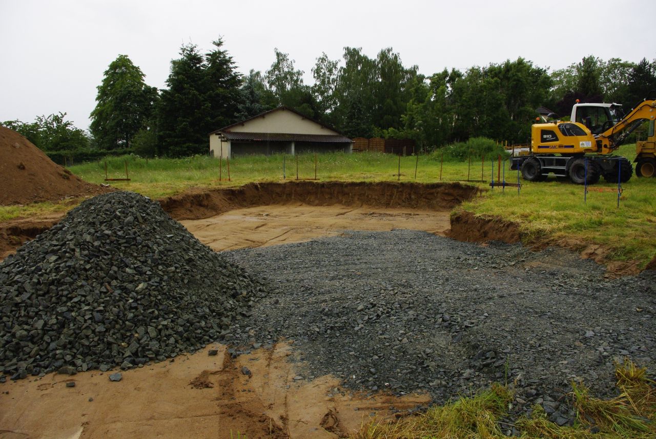 Terrassement du terrain jusqu' 1 m autour de la dalle