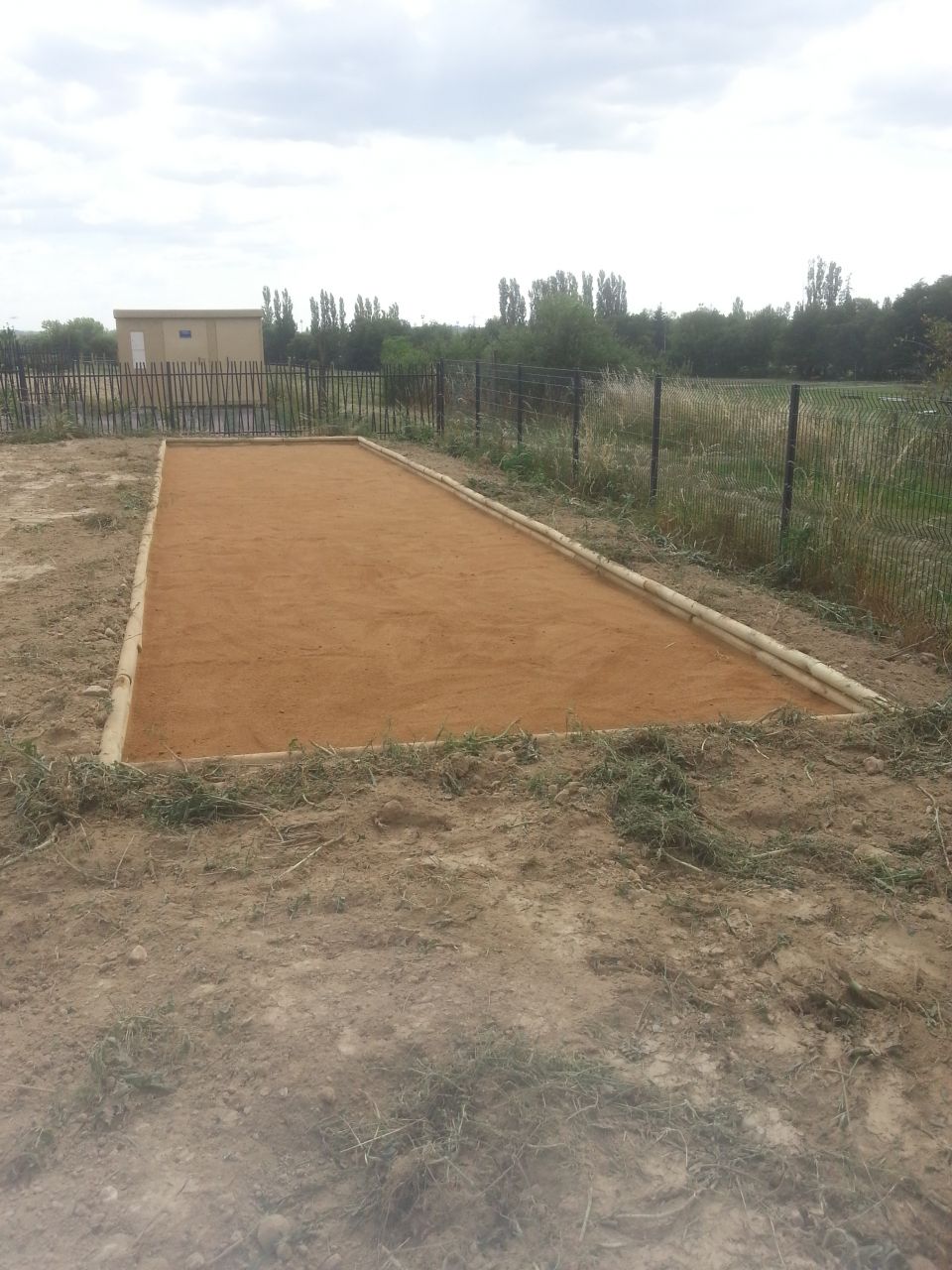 réalisation d'un terrain de boules 3mX14m
