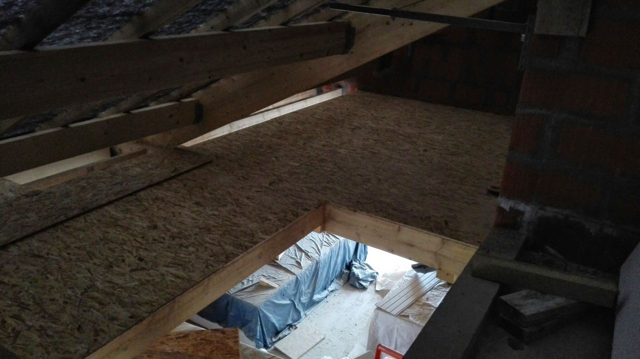 Pose d'un plancher au dessus du garage pour plus de rangement !