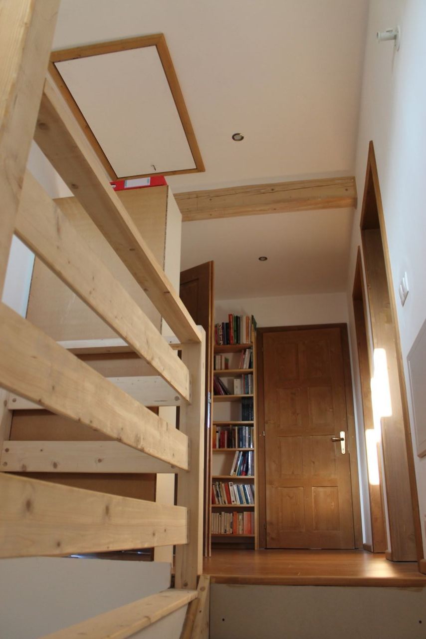 En haut de l'escalier