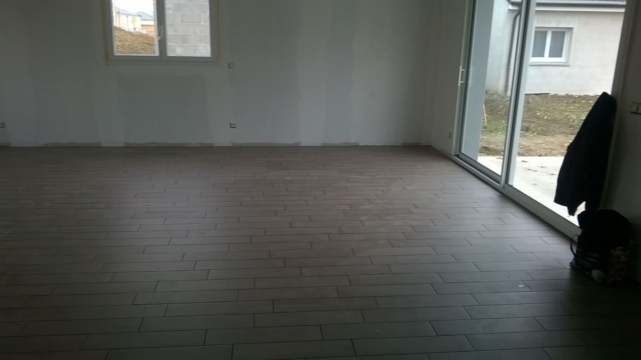 Début de pose par un pro, ca va vite et c'est déjà joli.