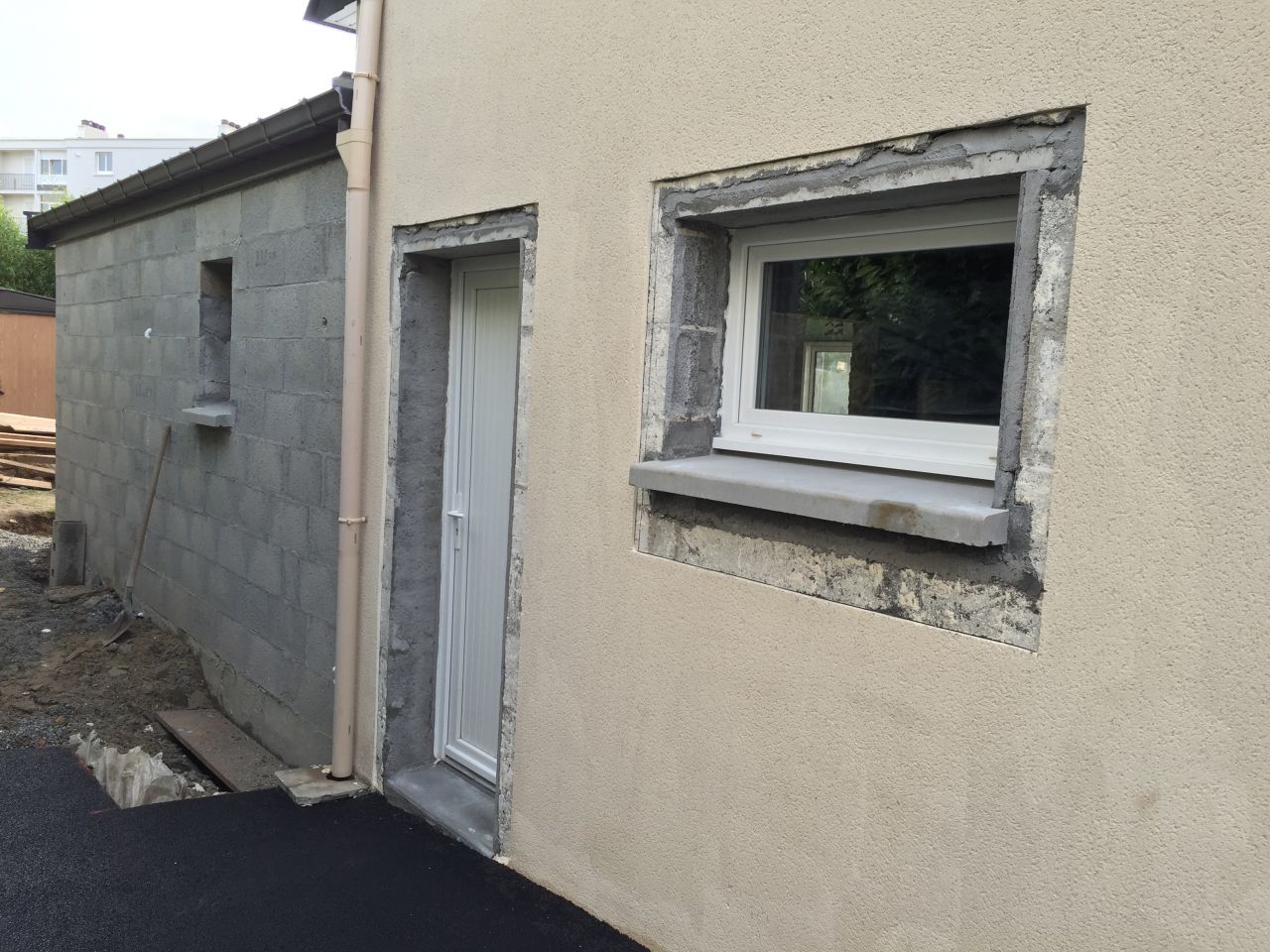 Déplacement porte de garage et fenêtre à soufflet