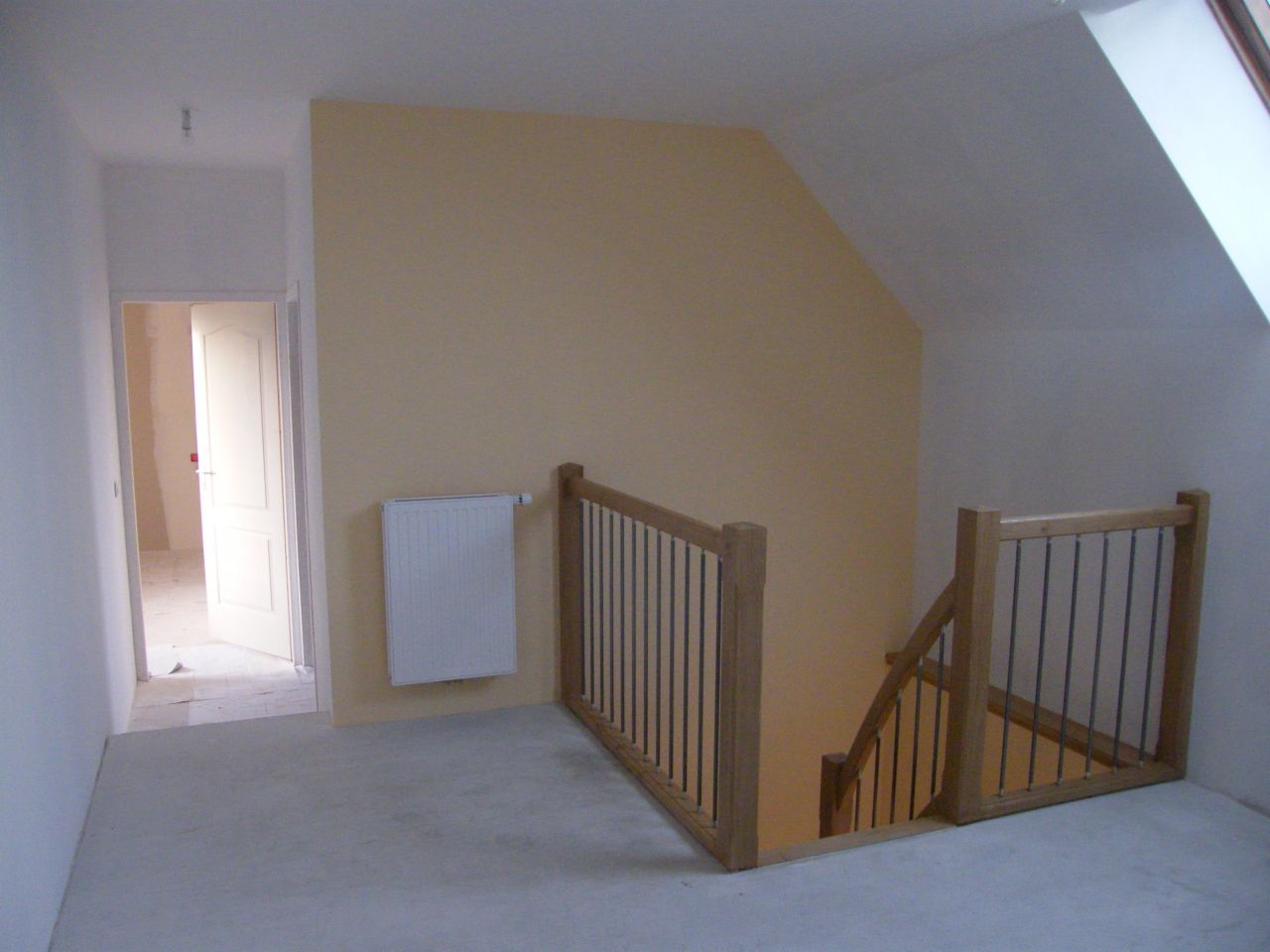 Escalier en chêne vitifié.