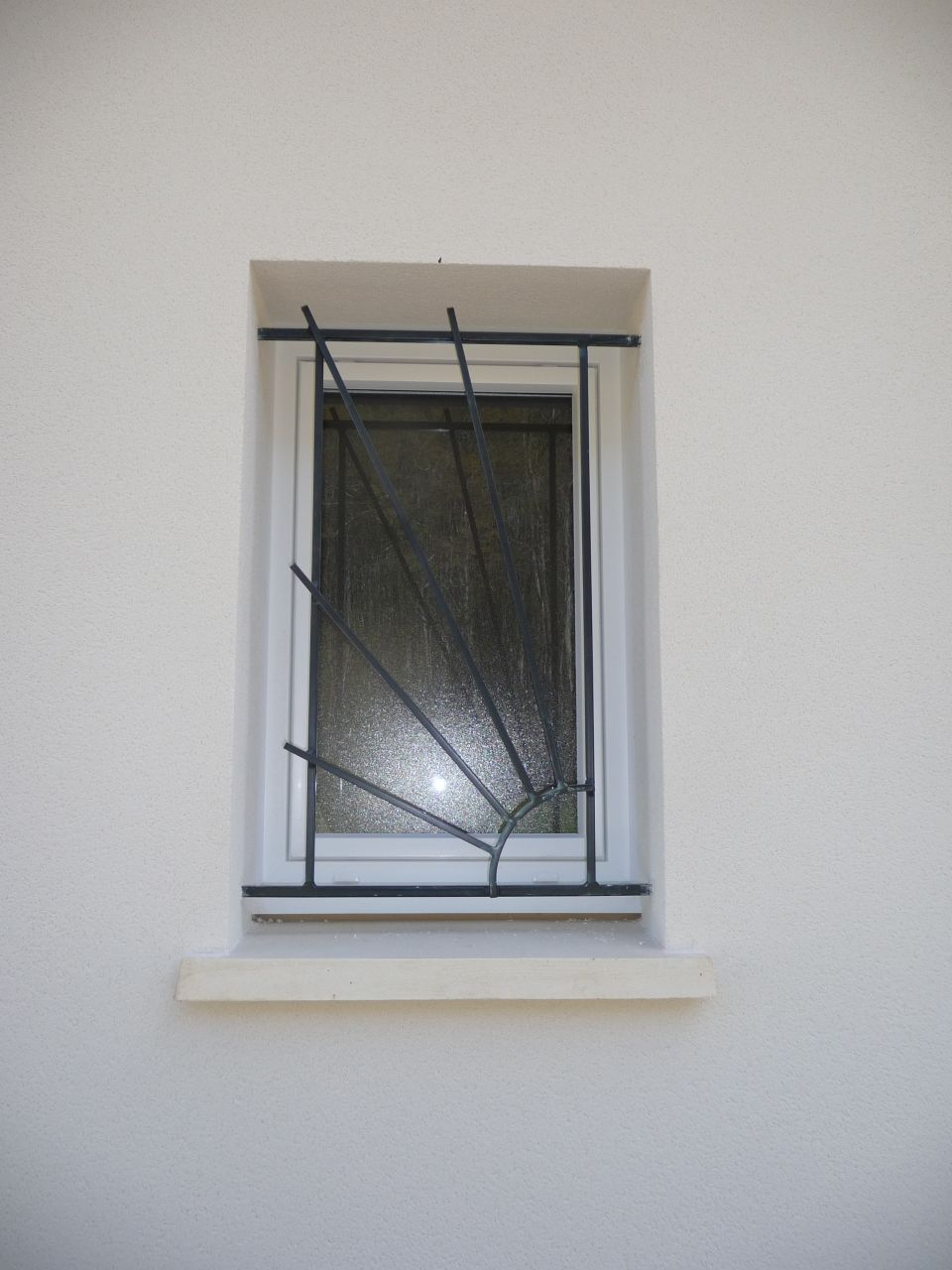 Finition, grille de défense