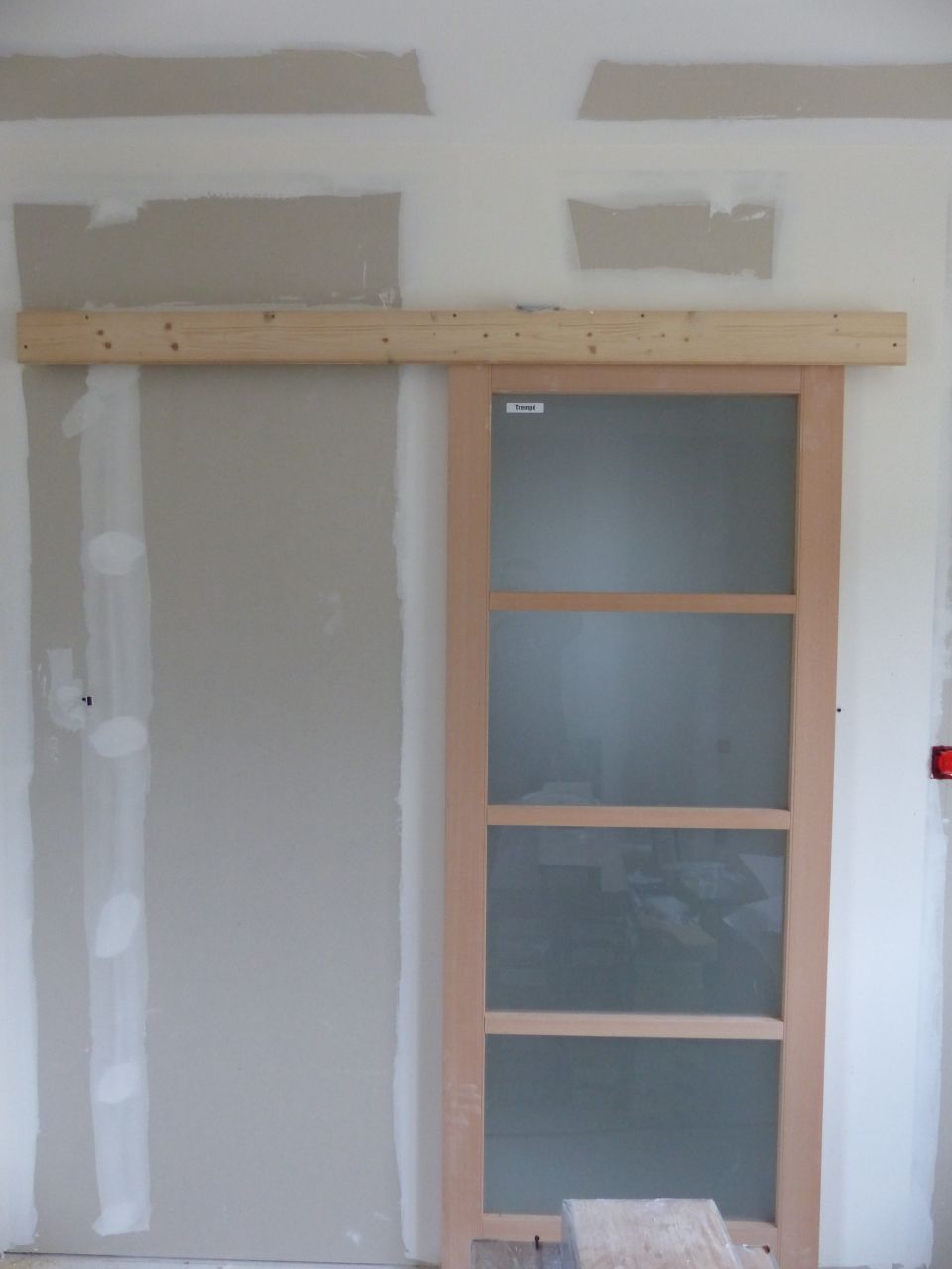 Porte coulissante entre la chambre et le dressing