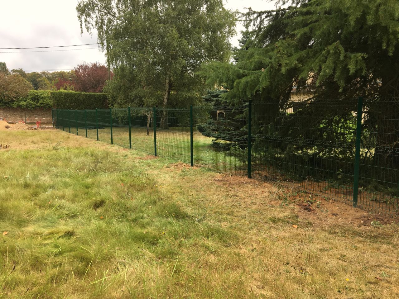 Clôture d'un côté