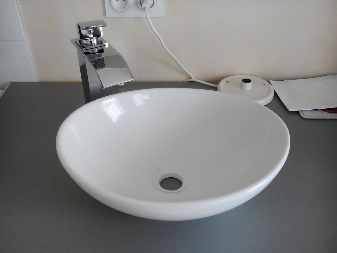 Vasque et mitigeur reçus