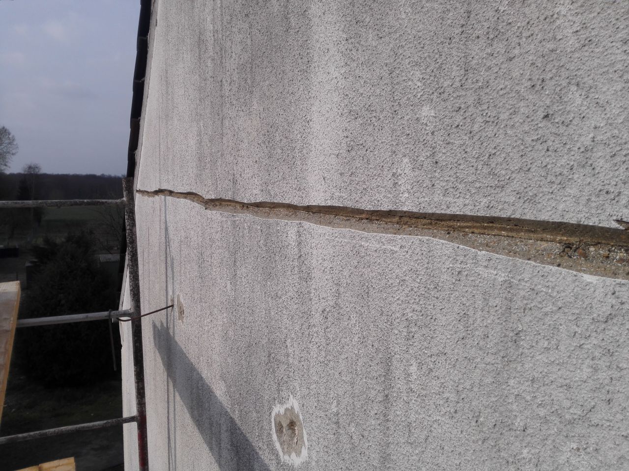Fissures sur pignon Ouest
