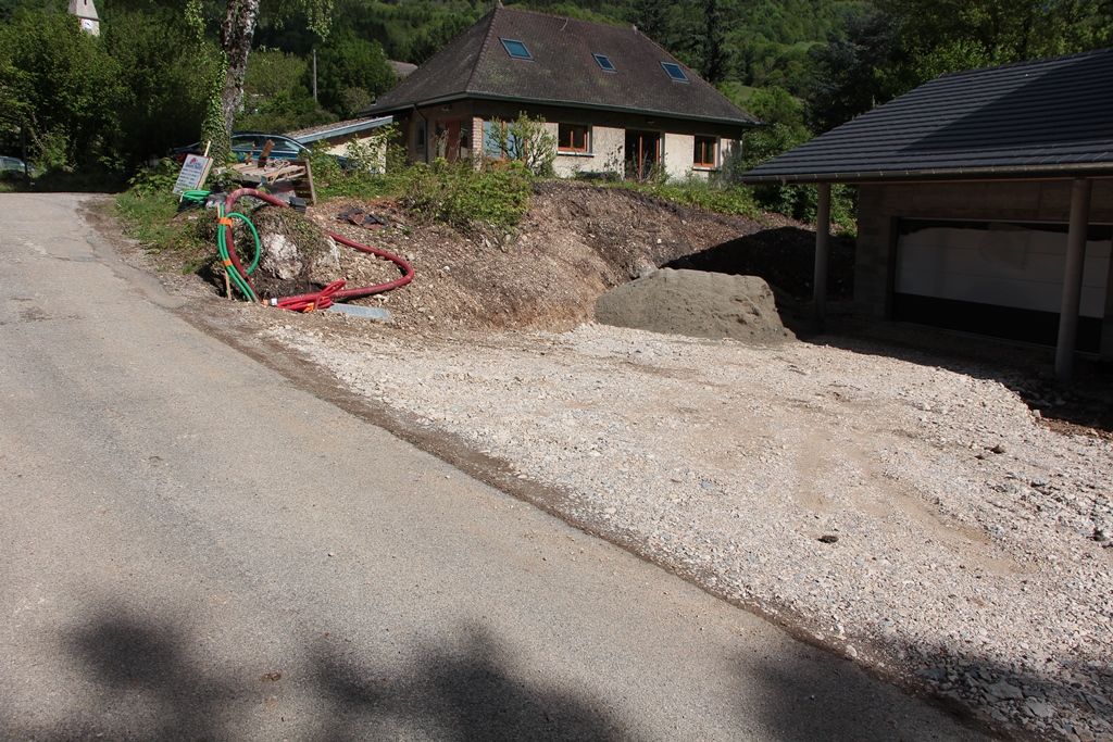 Terres remises en place et entrée de garage