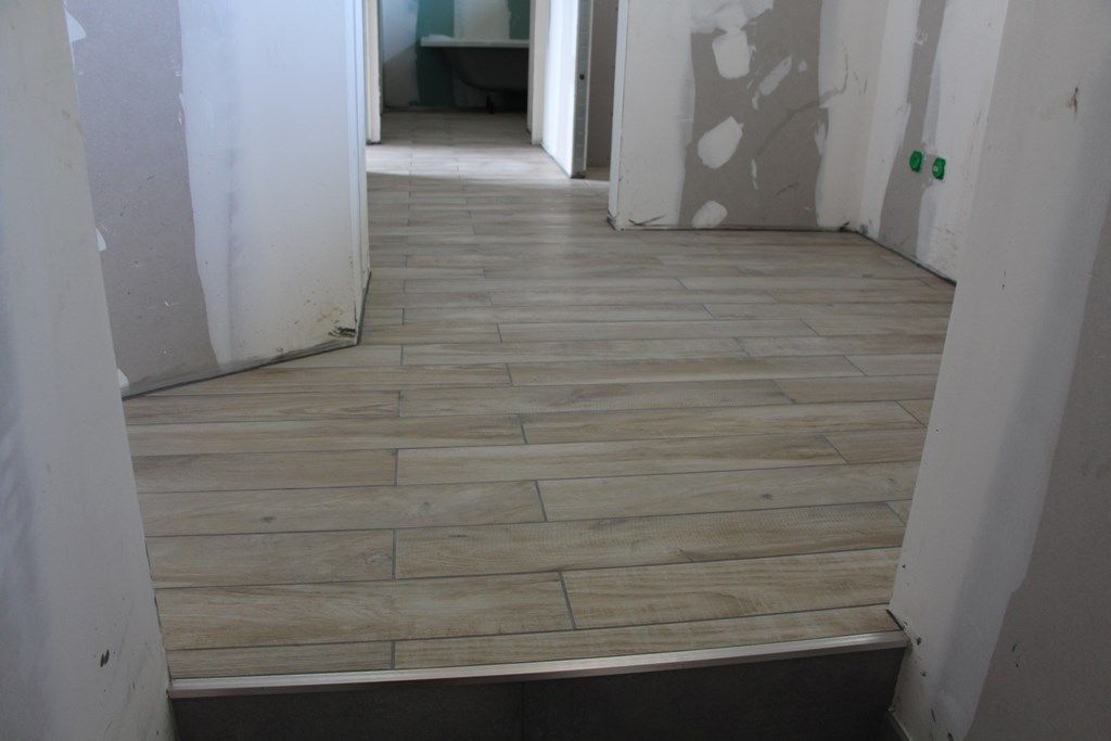 Carrelage "parquet" à l'étage