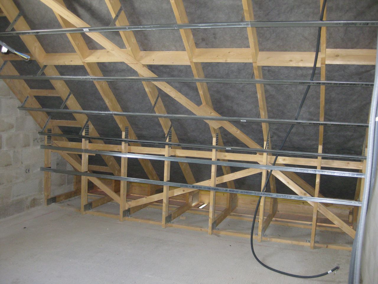 Vue de la chambre au dessus du garage. On se rend mieux compte de l'espace prévu.