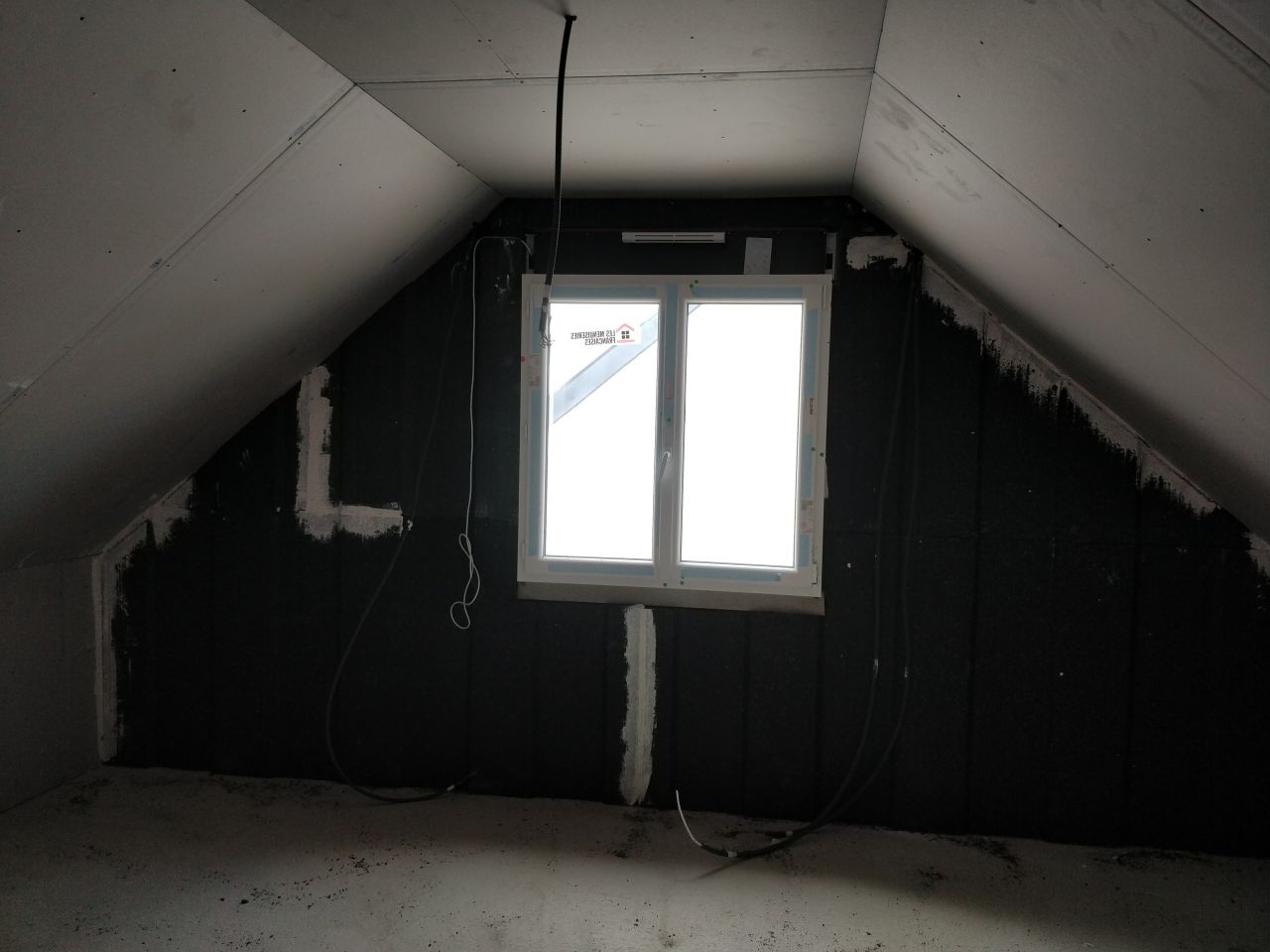 Isolation en cours - 1ère passe mur chambre au dessus garage