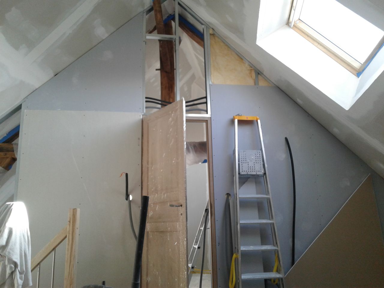 Mise en place des cloisons et portes