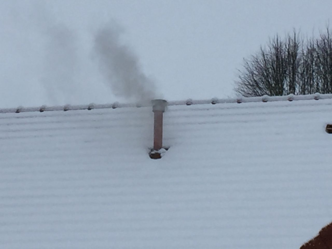 Fume en sortie de toit photo 1