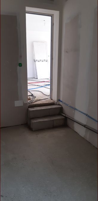 Les marches du garage vers la cuisine