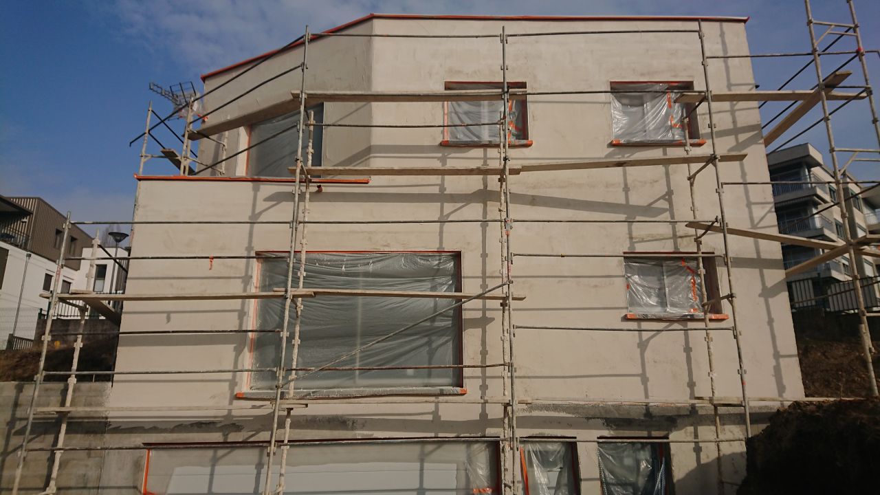 Première couche enduit façade