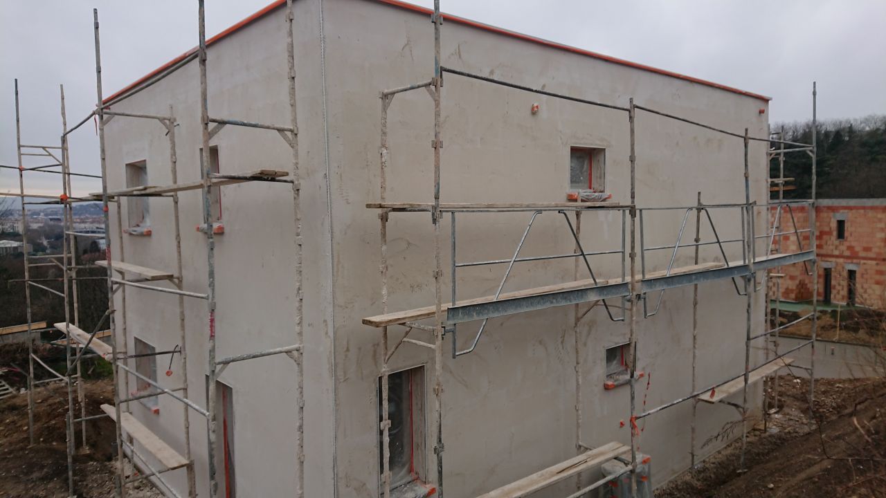 Première couche enduit façade