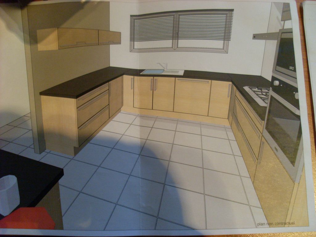 vue de la cuisine 
<br />
en bas a gauche un meuble de 120*60 avec plan en granit noir en 150*90.