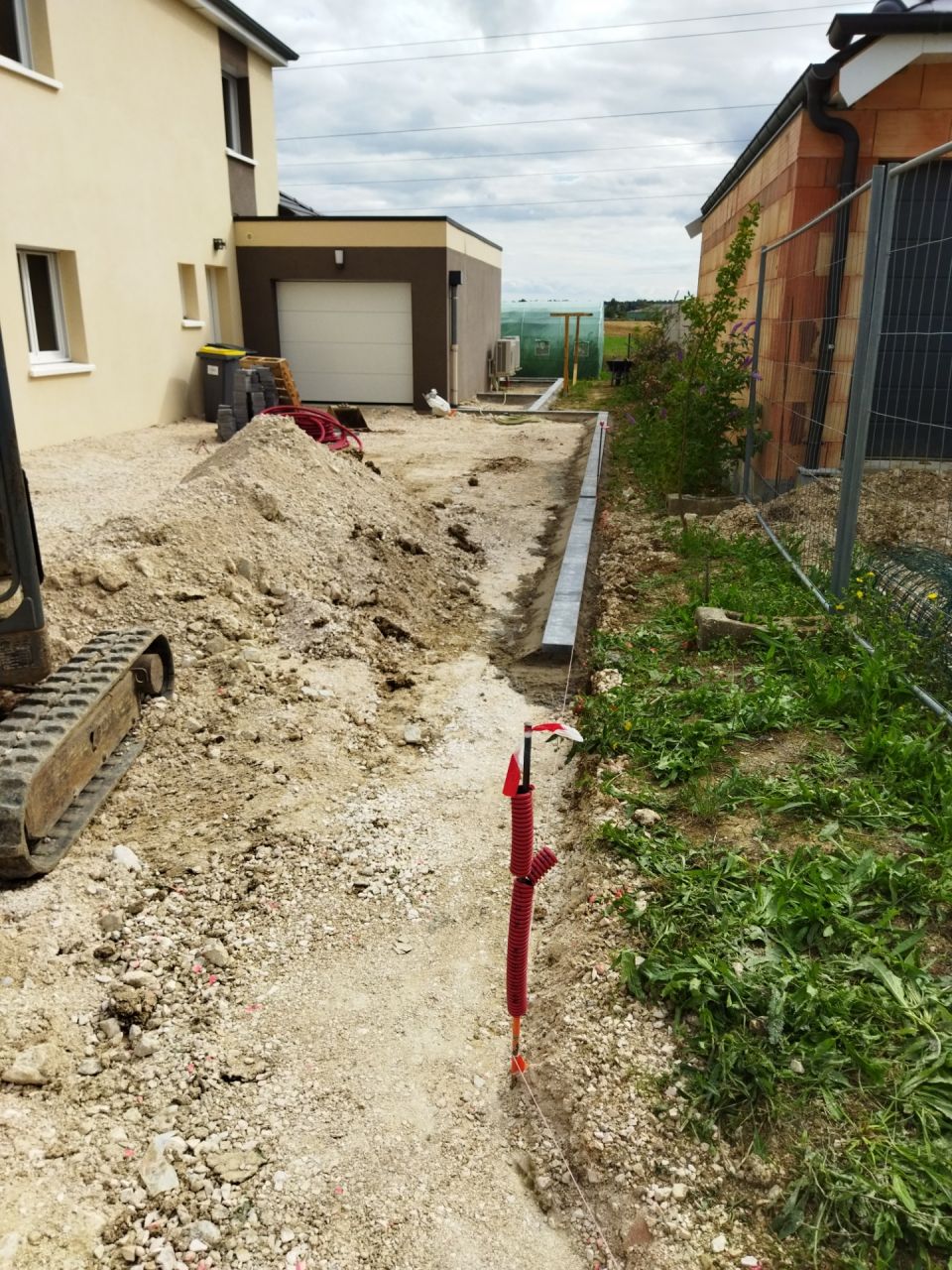 Préparation joints béton drainant accès principal