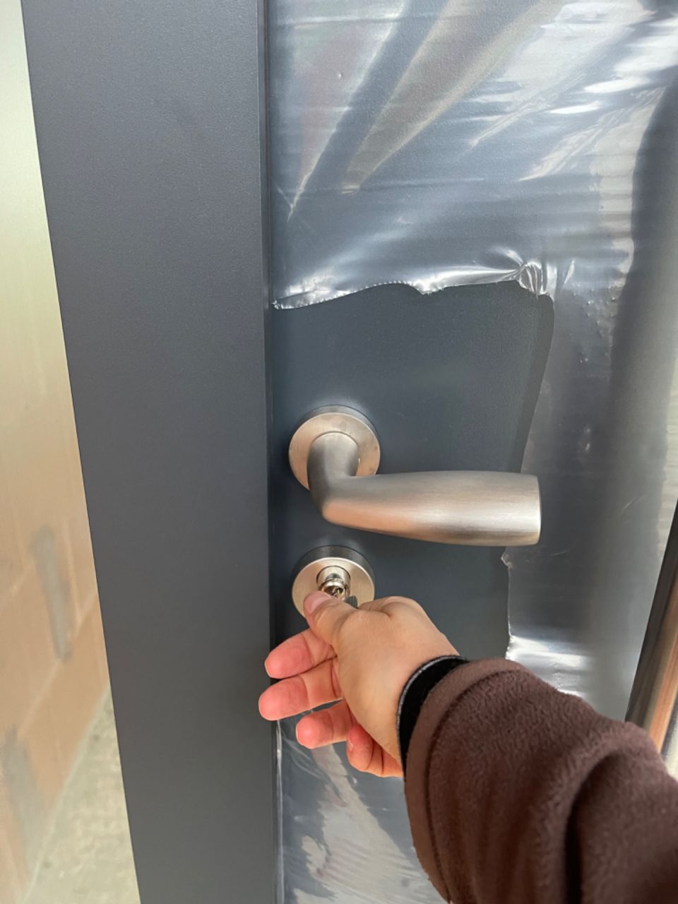une clé, une porte, une serrure