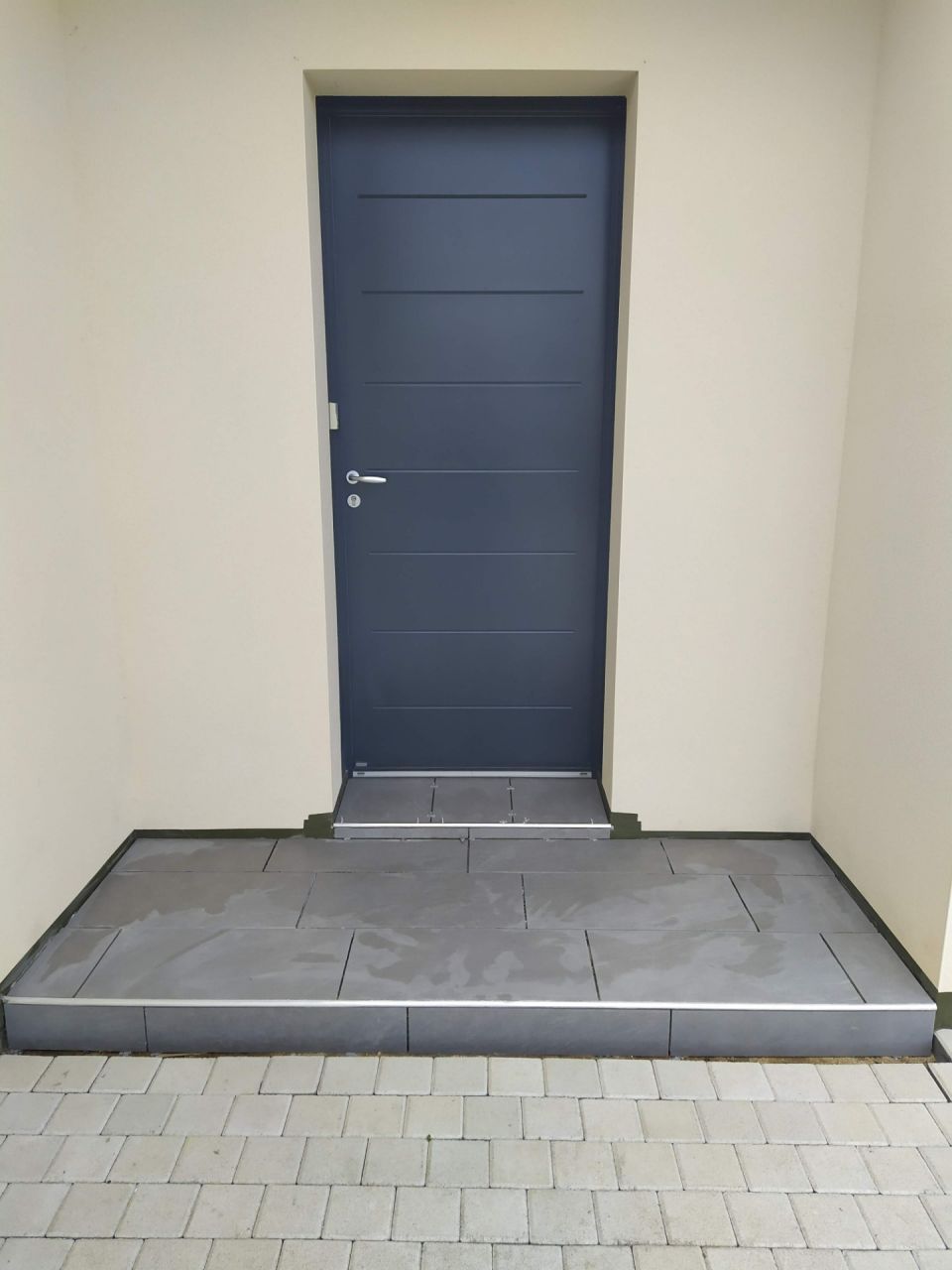 Carrelage seuil porte d'entrée