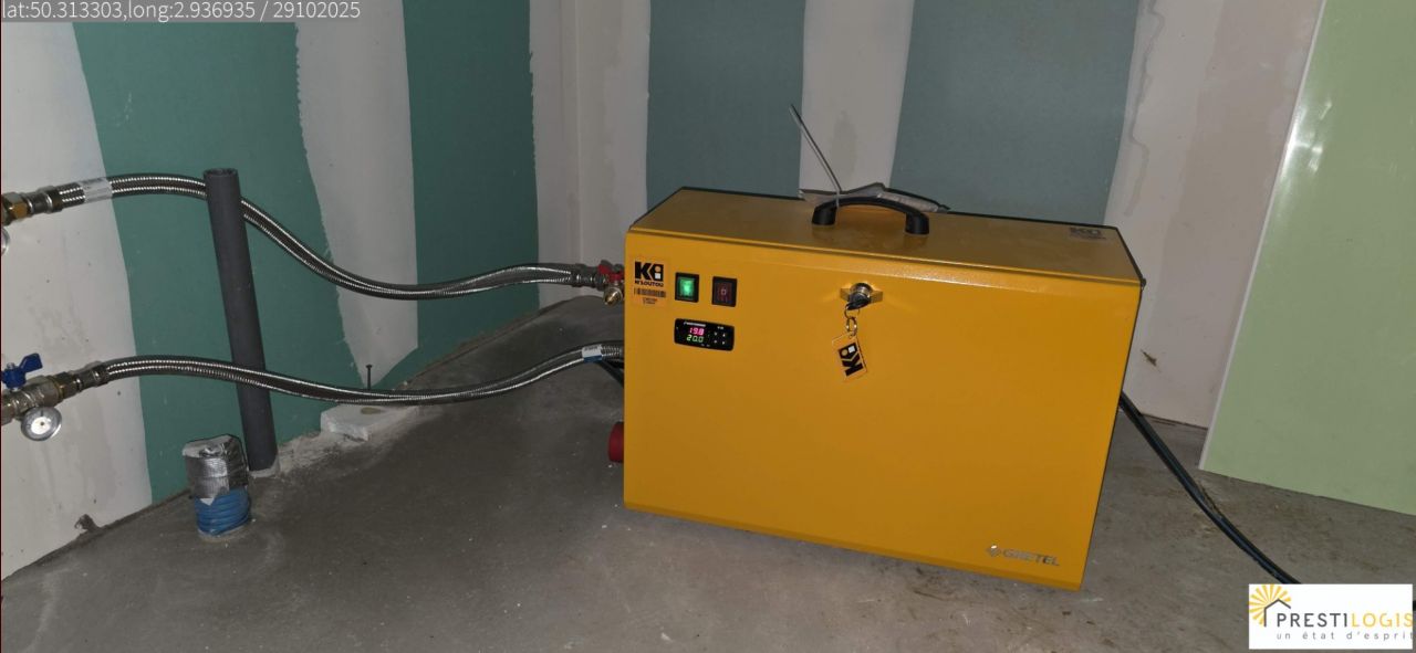 Mise en chauffe du plancher chauffant avant pose du carrelage par chaudire provisoire lectrique.