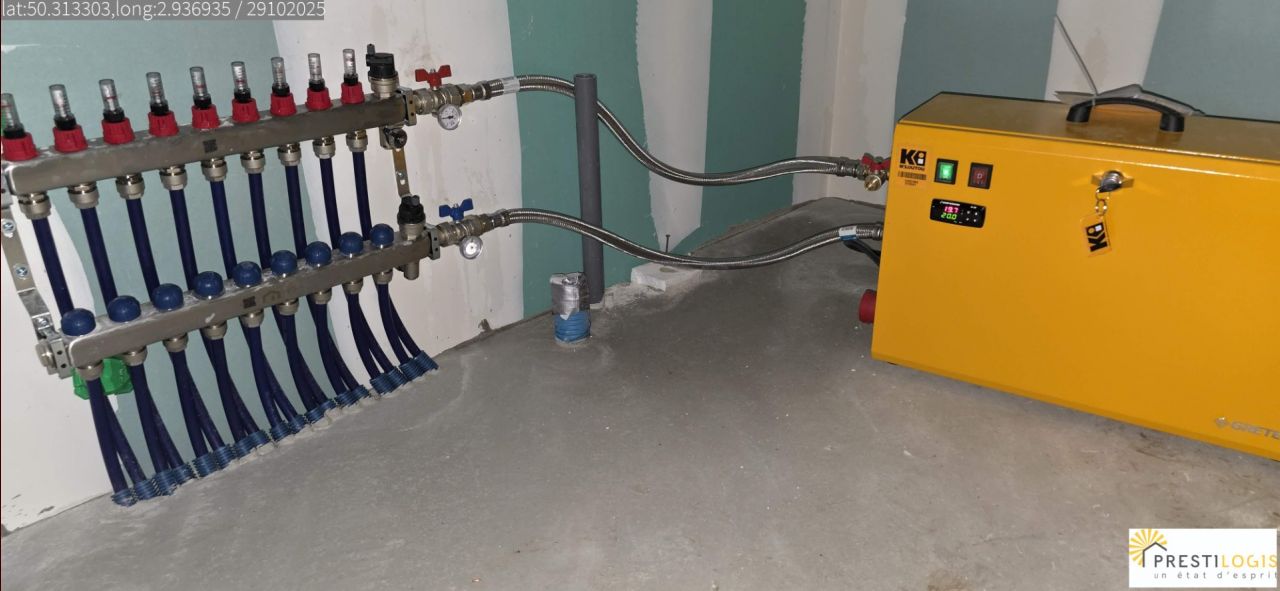 Mise en chauffe du plancher chauffant avant pose du carrelage par chaudire provisoire lectrique.