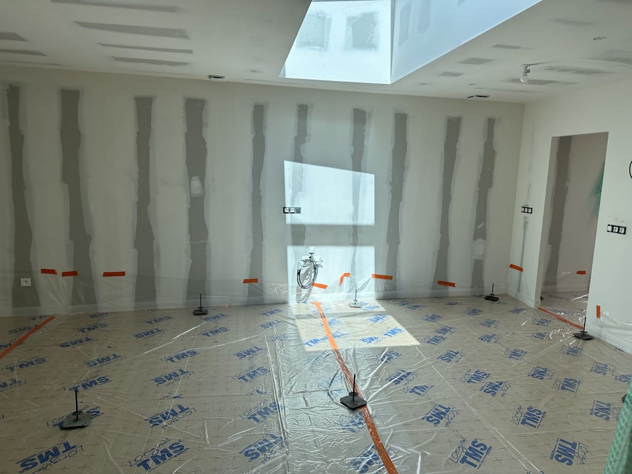 Mise en place de l'isolant avant la chappe