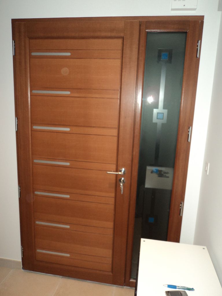 Porte d'entrée coté intérieur bois / extérieur Alu
