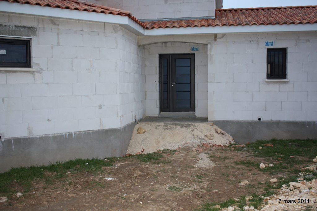 palier de porte d'entrée sous porche