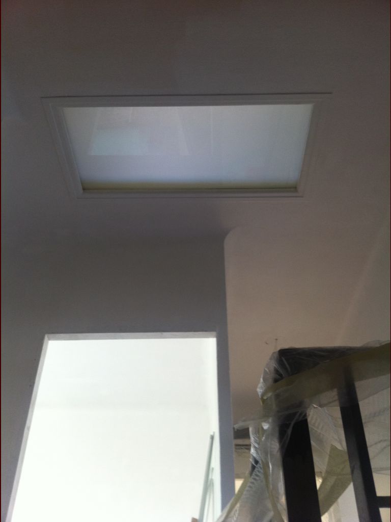 Changement de la fenêtre d'accès aux combles par un double-vitrage en verre feuilleté dépoli