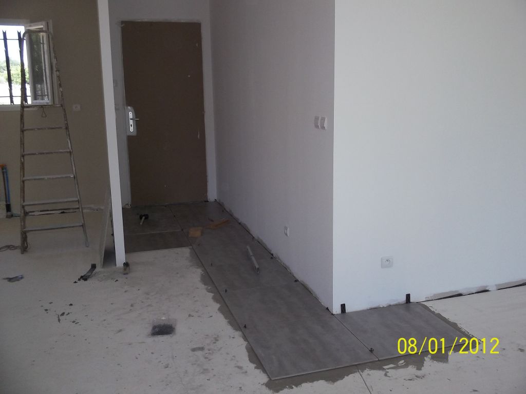 debut pose carrelage, c'est du gres cerame en 60*60cm