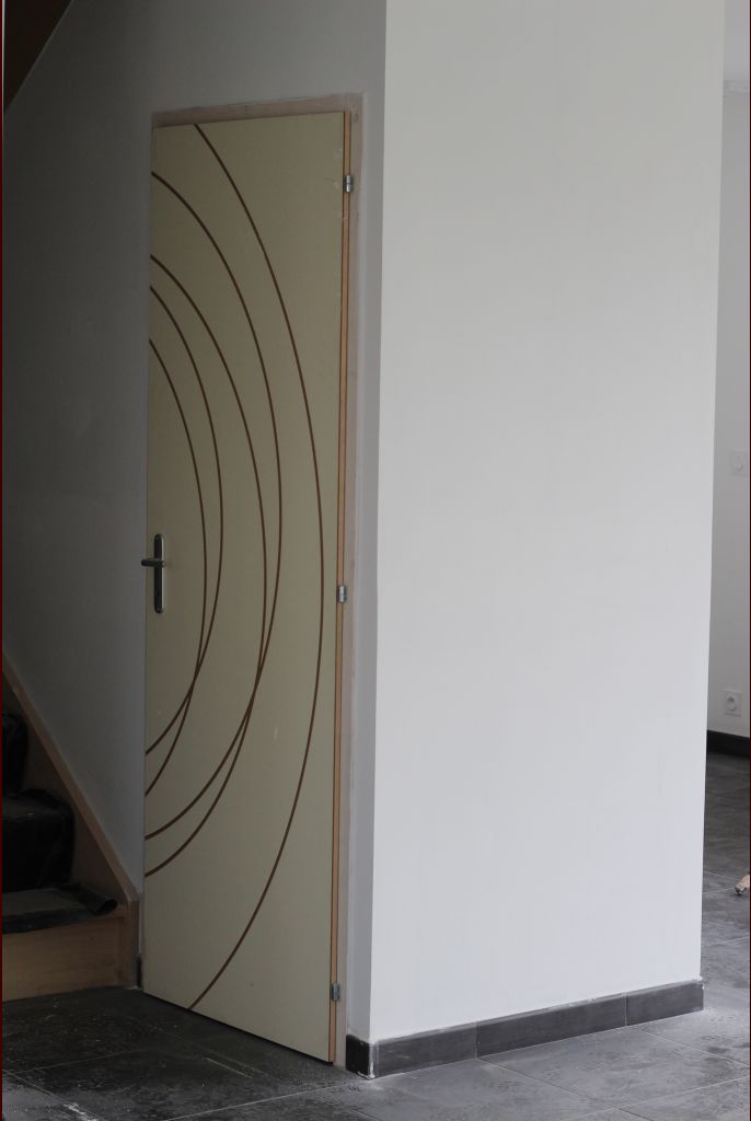 Au rdc, porte des WC