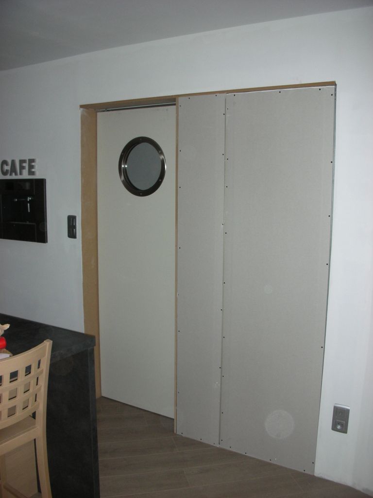 Montage des portes coulissantes du RDC