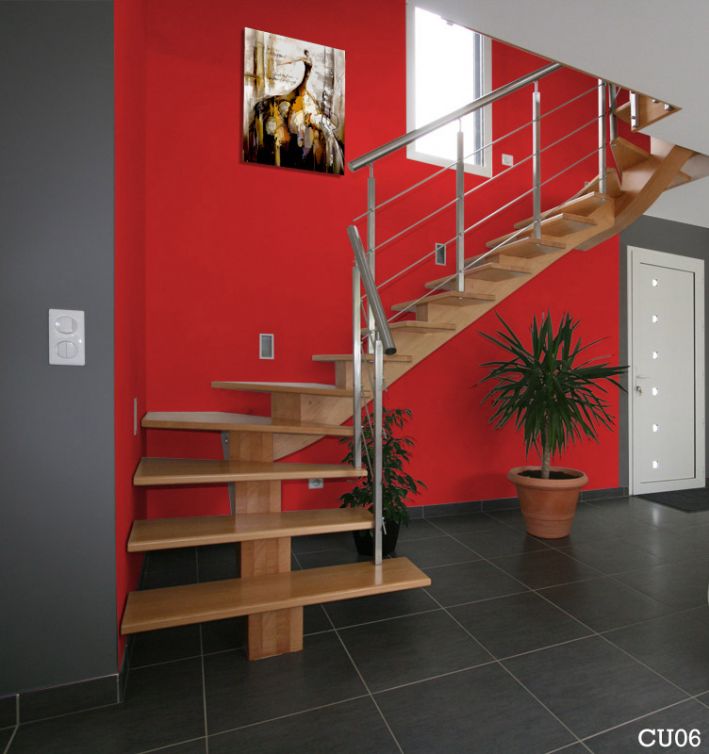 Nous avons finalement signé pou un escalier de ce type, avec main courante et poteaux en bois