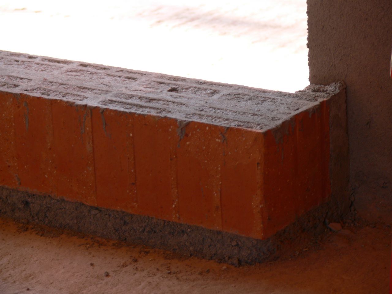 Seuil maçonné sur terrasse