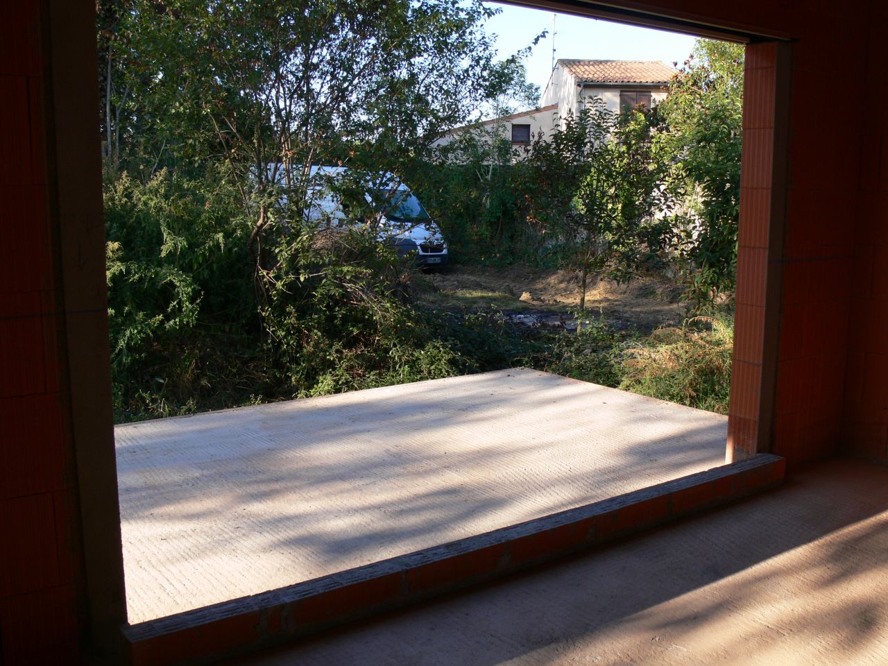 Seuil maçonné sur terrasse