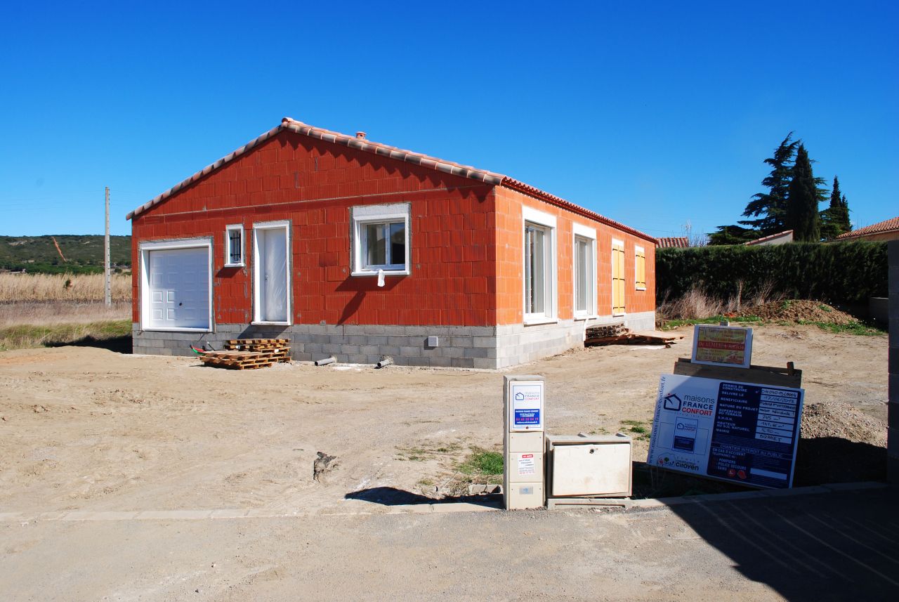 Maison sur le terrain