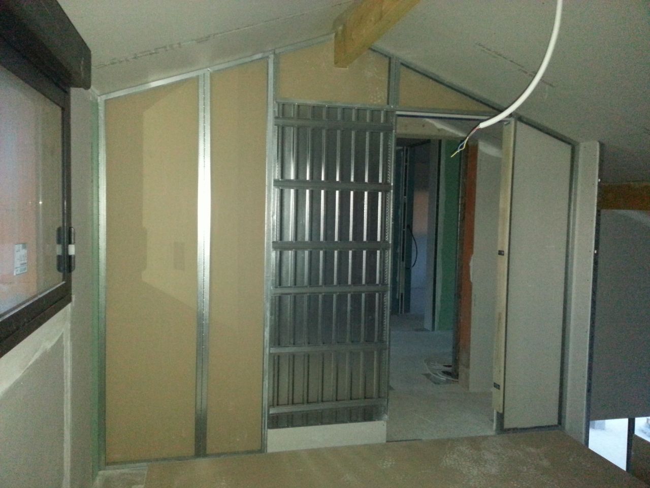 Porte à galandage sur mezzanine.