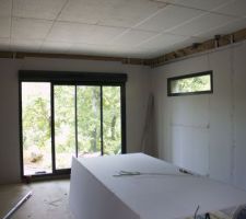 Mise en place de l'isolation et des cloisons.