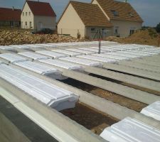 Pose de l'isolation pour plancher.