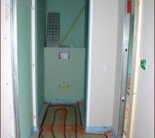 Wc bas pose du plancher chauffant