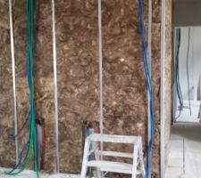 Isolation des cloisons en laine d'Ecose