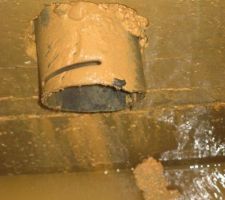 Sortie du drain dans le puisard pendant le chantier