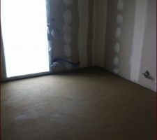Chape coulée dans la chambre de la grande.