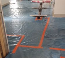 Protection des sols et fenêtres avant peinture