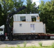 Transfert sur camion plus petit pour accès au terrain