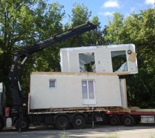 Transfert sur camion plus petit pour accès au terrain