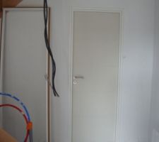 Porte de la chambre RDC.