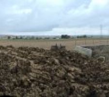 Recouvrement des terres en cours....